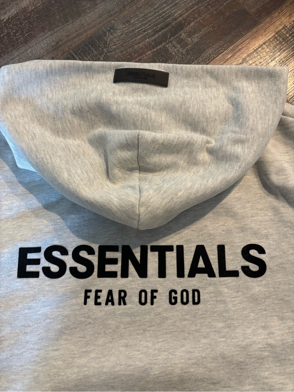 Fear of God Essentials Hoodie in Light Gray with Black Logo